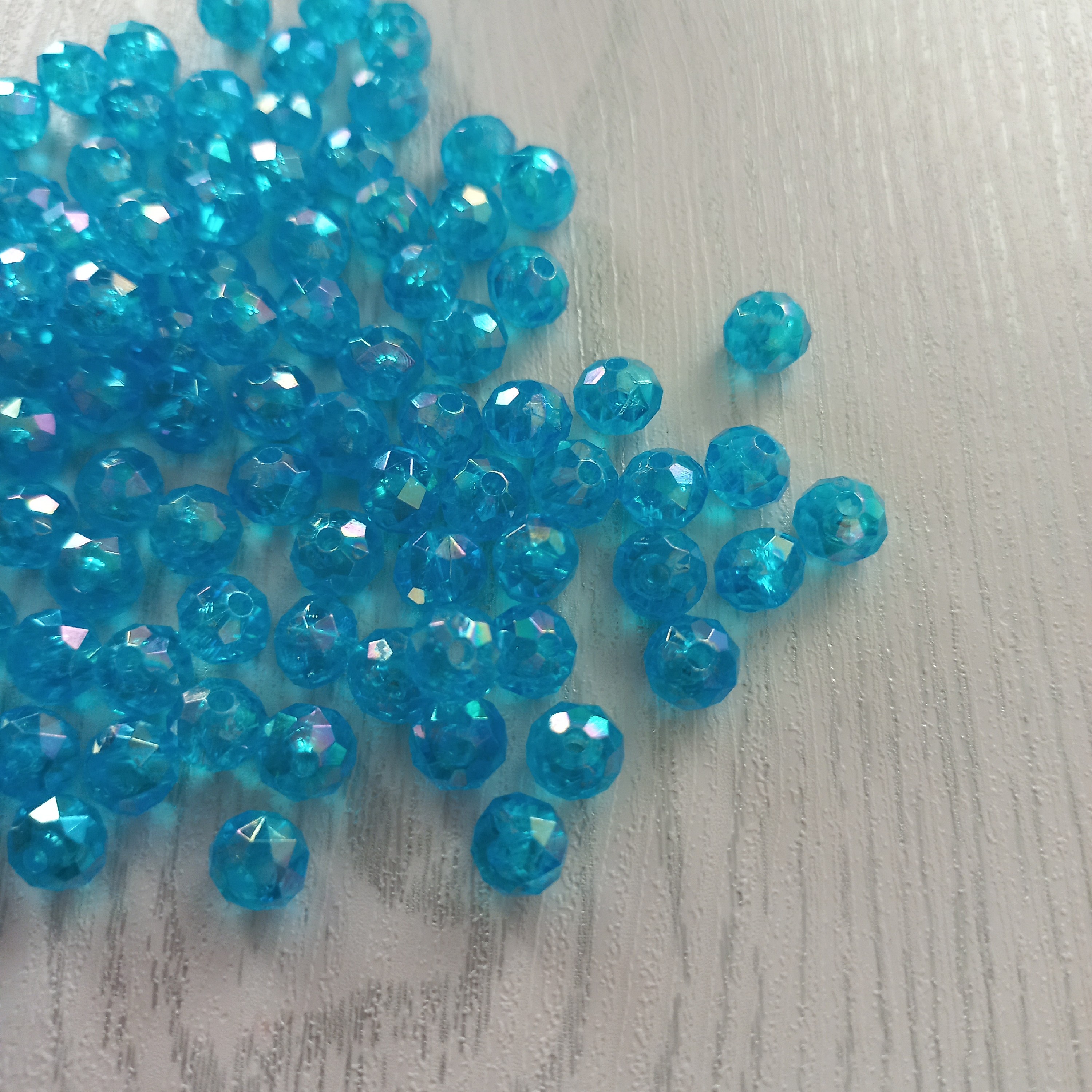 مهره کریستالی رنگ آبی سایز 8 میل بسته 20 گرمی